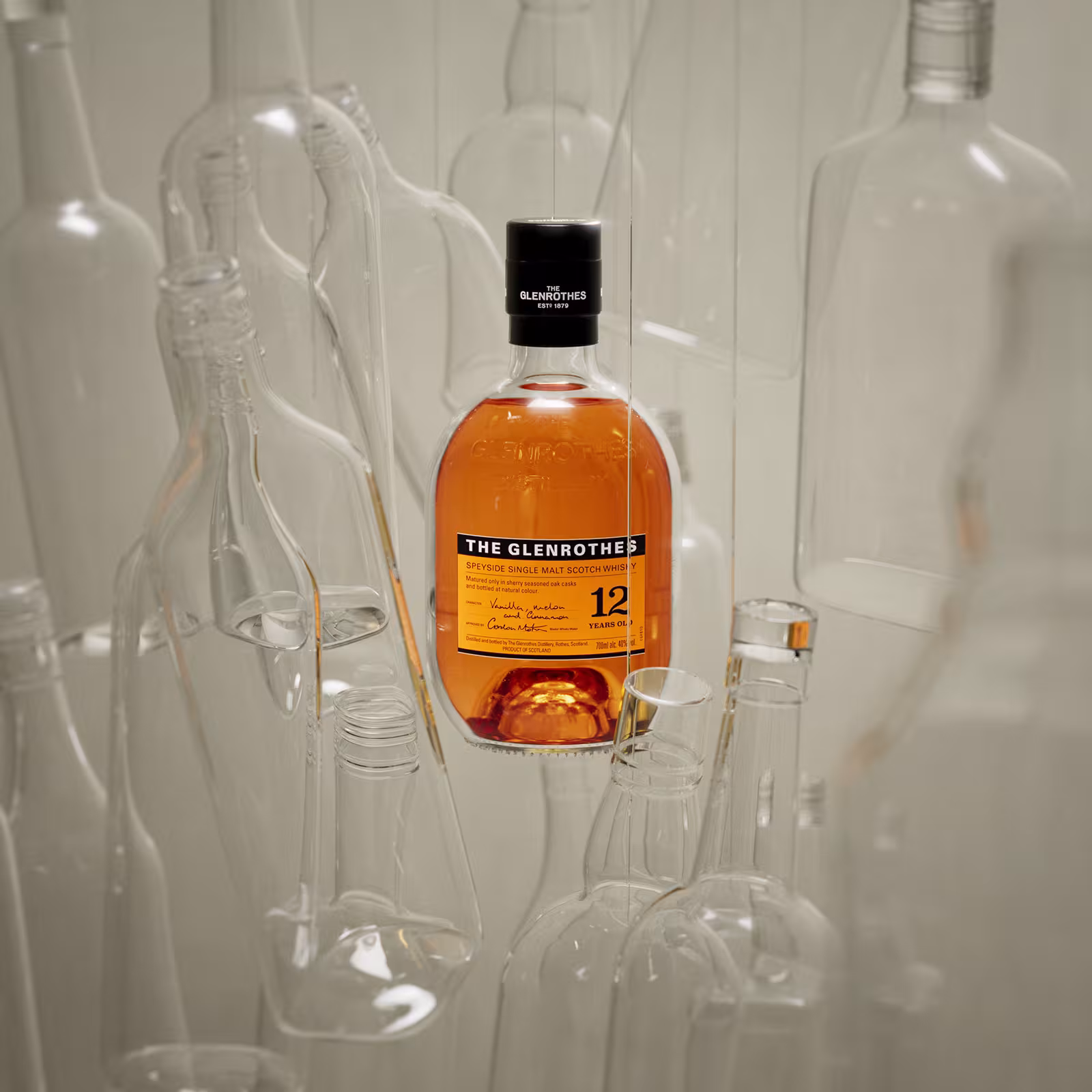 A 700ml bottle of The Glenrothes Whisky 12 Year Old in a glass world