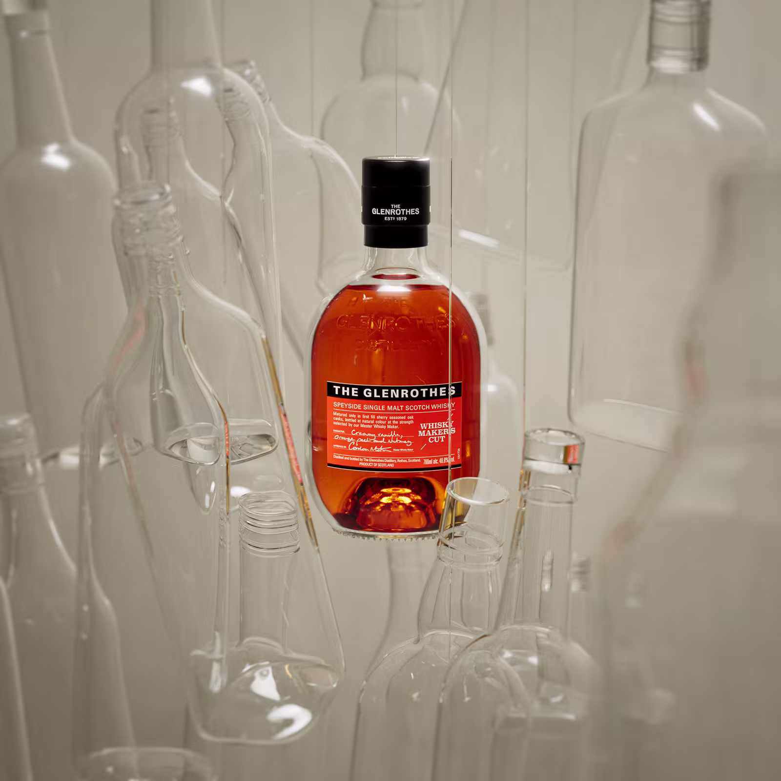 A 700ml bottle of The Glenrothes Whisky Maker's Cut in a glass world